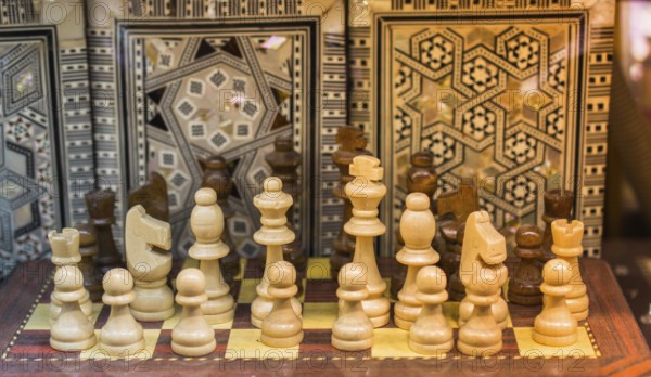Intellectual game -chess. Wooden chess pieces on the chessboard