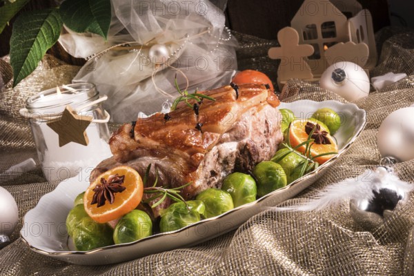 Christmas dinner with brussels sprouts in orange sauce