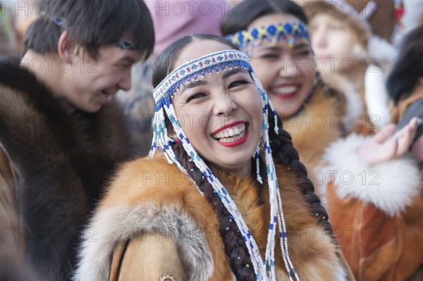 Portrait expression smiling woman in traditional clothing indigenous inhabitants of Kamchatka. Celebration Koryak national ritual holiday Hololo Day of Seal. Kamchatka Region, Russia, Nov 4, 2018, Europe