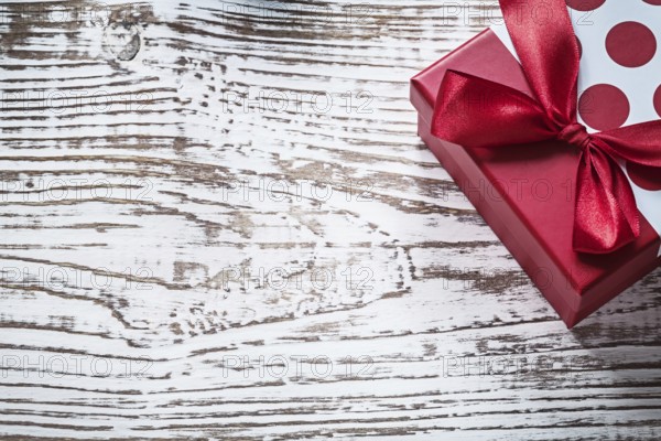 Packed present box on vintage wooden board copy space holidays concept