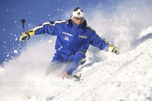 Skiers in action, deep snow, Austria, Europe