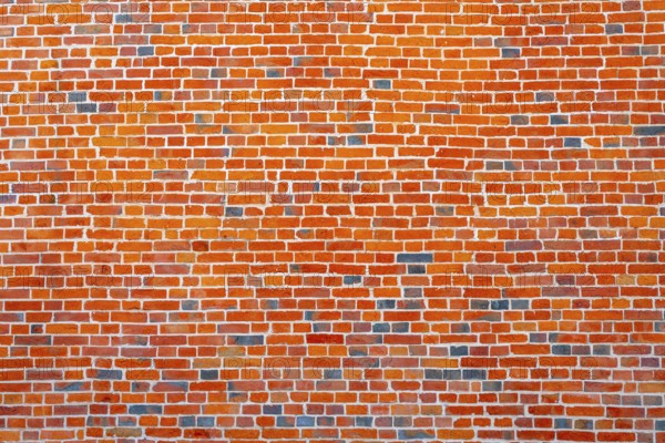 The background of the old red brick wall for design interior and various scenes or as a background for video interviews