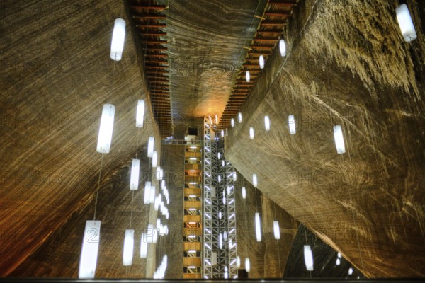 A look inside the historic Salina Turda salt mine with lights in Romania