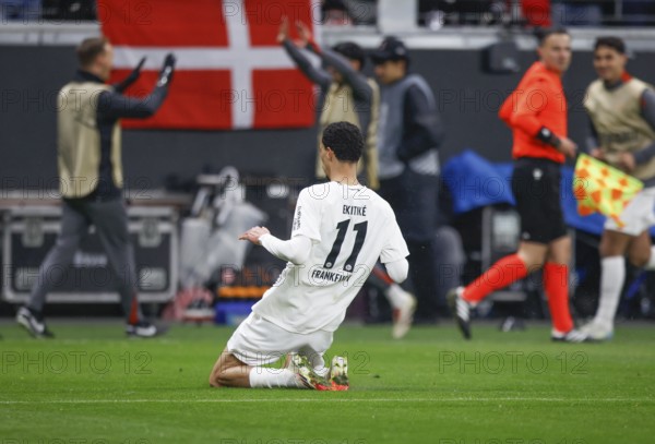 Football, Europa League, Round of 16 second leg, 2024/2025, Eintracht Frankfurt vs. Ajax Amsterdam, 13/03/2025, Frankfurt Stadion, Frankfurt, Germany, Hugo EKITIKE (Eintracht Frankfurt, 11) celebrates his 3 - 0 win by sliding on his knees, Europe