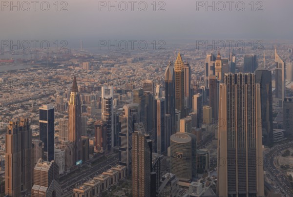 A picture of the tall buildings at the Trade Centre district at sunset