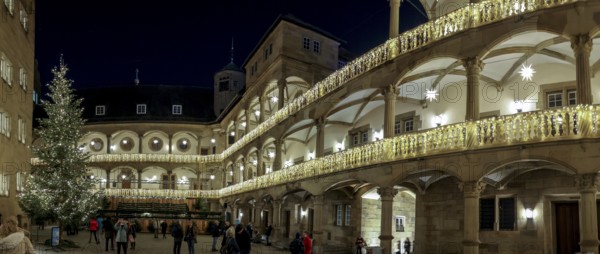 Panoramic photo of the Christmas decorated courtyard of the Old Palace at night, Stuttgart, Baden-Württemberg, Germany, Europe