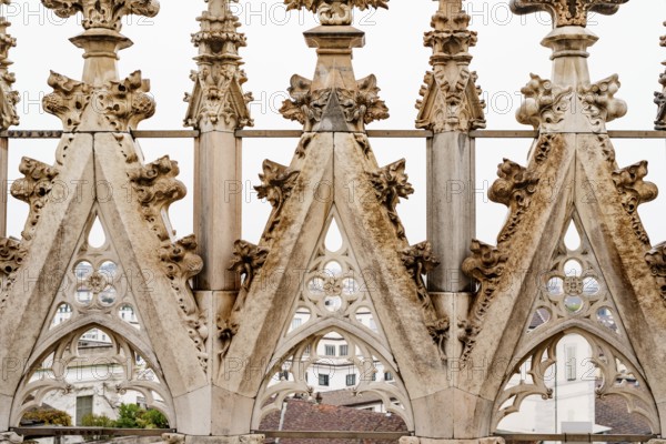 Marble patterns on the spires on the roof of the Duomo. Milan, Italy.
