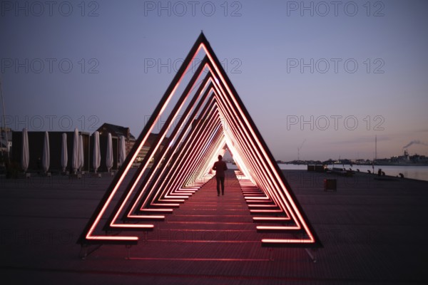 Copenhagen, Denmark, February 05, 2020: Art installation The Wave on Ofelia Square by artists Vertigo and Louise Alenius for the Copenhagen Light Festival, Europe