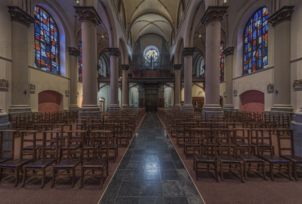 Brussels Old Town, Brussels Capital Region, Belgium, 12 12 2019 Symmetric interior design with stained glass of the Carmelites church, Europe