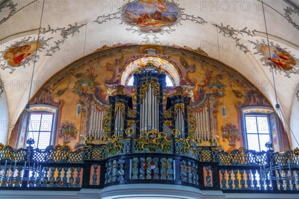 Inside the Beautiful Catholic Parish Church of St Peter and Paul in Old Town with Music Instrument Organ in a Sunny Summer Day in Andermatt, Uri, Switzerland, Europe