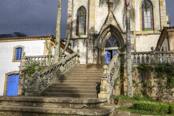 View to entrance stairway of church in sunlight, Sanctuary Caraca, Minas Gerais, Brazil, South America