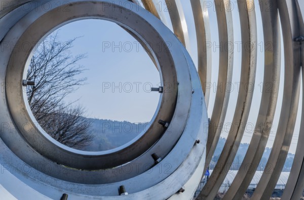 Cheonan, South Korea. January 3, 2020: Closeup sculpture of concentric circles inside one another in public park near entrance to Yu Gwan Sun shrine. Artist unknown