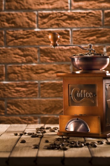 Wooden coffee grinder on table