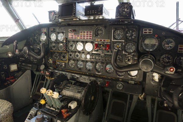 Flight desk control panel on an airplane designed for aerial cartography, reconnaissance and transport. Old technology aircraft
