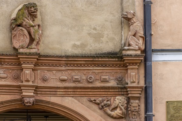 Detail of famous historical buildings from the German Renaissance from 1609 Head house by the architect Albert Schmidt, with 106 heads or grotesque masks in the Rue des Têtes, Colmar, Alsace, Département Bas-Rhin, France, Europe