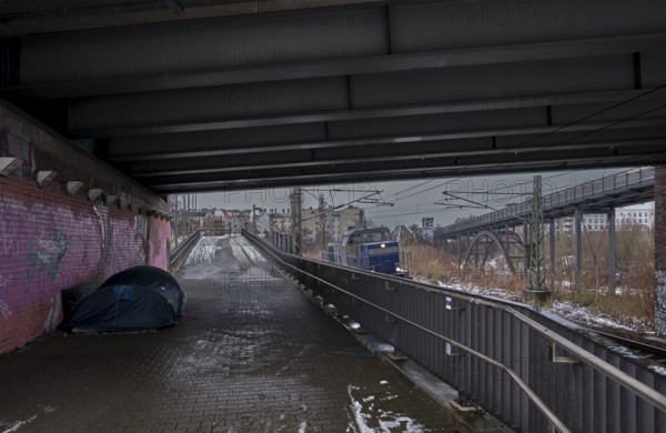 Germany, Berlin, 10.01.2025, subway Behmbrücke, tent of a homeless person, diesel locomotive, Europe
