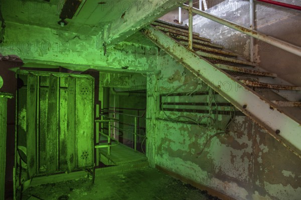 Old abandoned paper factory. Historic and typical factory building as a lost place. Destruction and decay are damaging the substance. Original machines and objects can be found here in Sweden