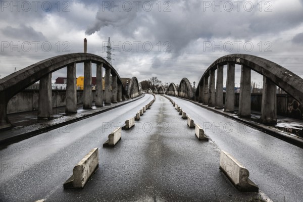 Brussels, Belgium, 03 28 2018: Old Industrial bridge called Leeuwoprit, Rampe du Lion, Albertbridge with bad weather comming, Europe