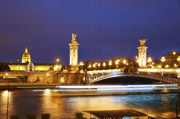 Pont Alexandre III in Paris France sunset over Seine river