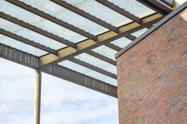 Section of a large front roof of an industrial building