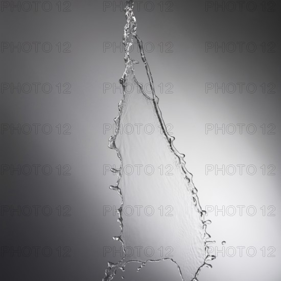 Water drop splash with grey background