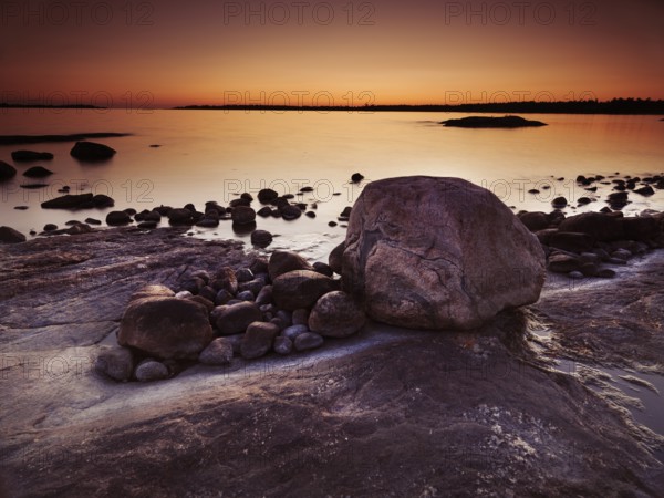 Beautiful twilight scenery of rocks on a shore of Georgian Bay, Muskoka, Ontario, Canada, North America