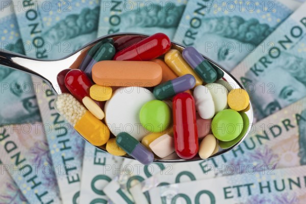 Swedish krona, the currency of Sweden. With tablets. Health costs. Austria
