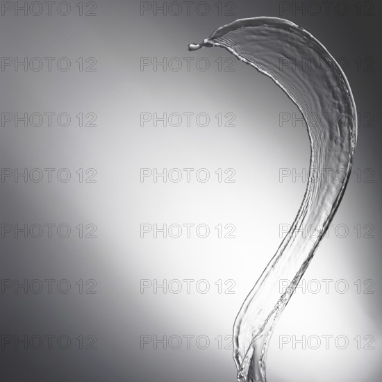 Water drop splash with grey background