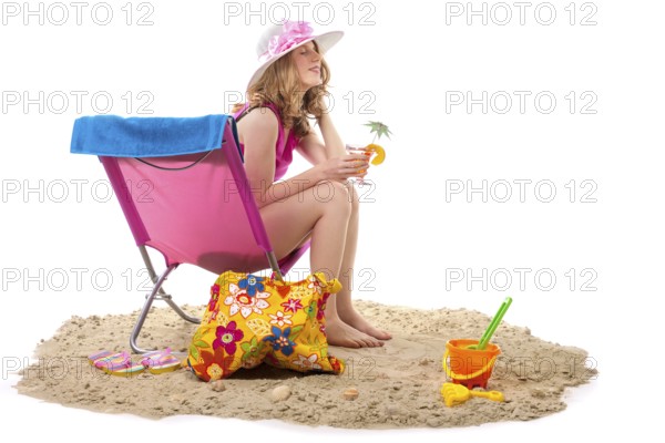 Beach with pink chair and woman isolated over white background