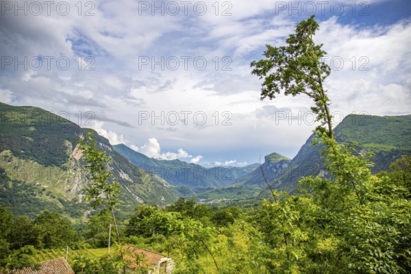 Coastal landscape shot. View from a road leading through a mountainous landscape and breathtaking green Mediterranean scenery. Coast near Salerno, Italy, Europe