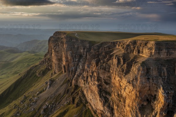 Aerial panorama view of plateau Bermamyt and hills at sunset, North Caucasus mountains, Russia, Europe