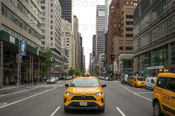 New York, USA - May 18, 2024: Taxi drivers on the streets of Manhattan