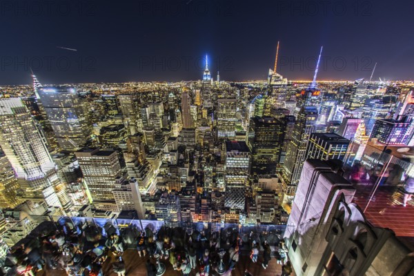 Rockefeller Center Observation Deck people 5 a view of the night view from the (top of the Rock). Shooting Location: New York, Manhattan