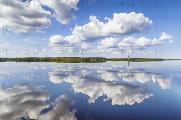 Landscape with a symmetrical reflection on the Vyg river (part of the White Sea-Baltic Canal), Russia, Europe