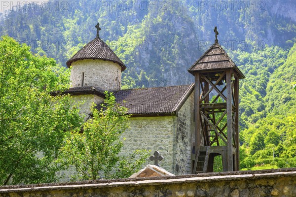 Dobrilovina Monastery in mountains of Montenegro at sunny summer day