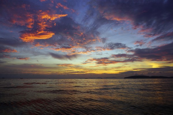 Beautiful fantastic colorful dramatic sea sunset landscape in Thailand