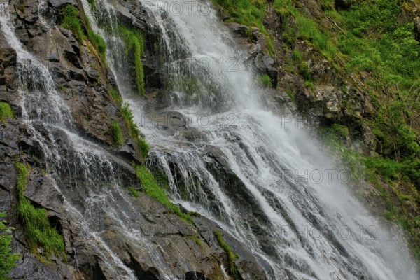 Close-up of a waterfall flowing over moss-covered rocks and conveying freshness, waterfall, Todtnau, Black Forest, Baden- Württemberg