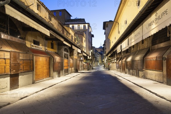 Florence, Italy, circa July 2021. Night light on Ponte Vecchio, Old Bridge, Europe