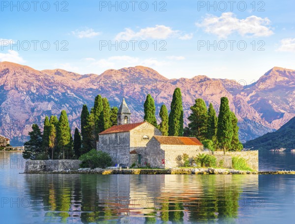 Island of Saint George among the mountains of Perast, Montenegro, Europe