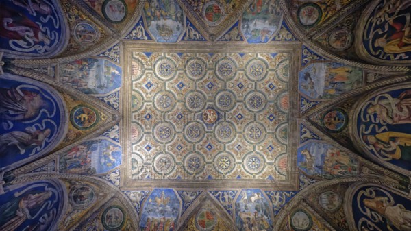 Geometric ceiling design with intricate frescoes and a dominant blue theme, Rome, Lazio, Italy, Europe