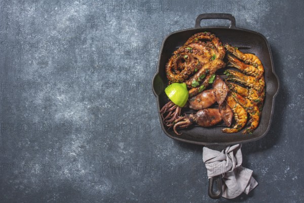 Food, Food, Grilled spimps, squids and octopus in cast iron grill pan