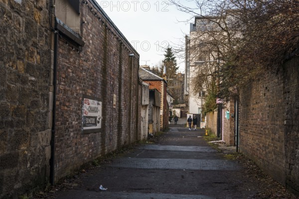 Glasgow, UK, December 6, 2023: View of Ruthven Lane in the West End of Glasgow. It is a trendy area with pubs, shops and restaurants close to the University of Glasgow