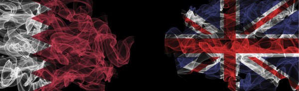 Flags of Bahrain and the United Kingdom on a black background, Bahrain vs United Kingdom Smoke Flags