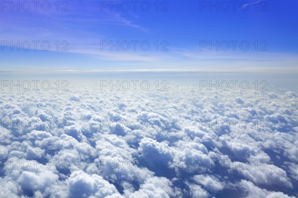Cumulus sea of clouds view from aerial view aircraft point of view