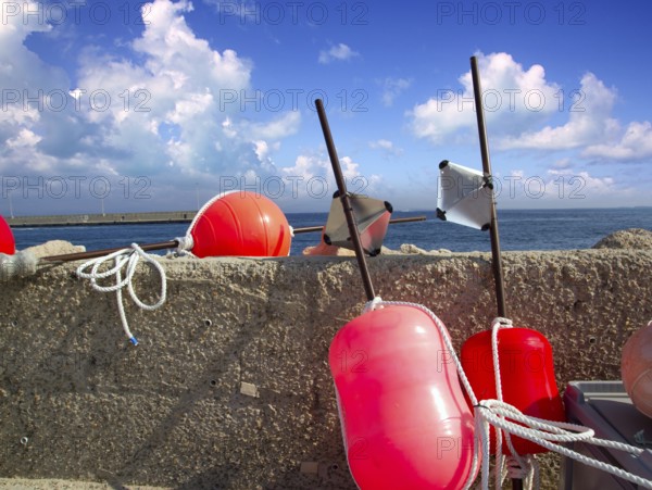 Longliner fisherboat buoy tackle in formentera blue sky