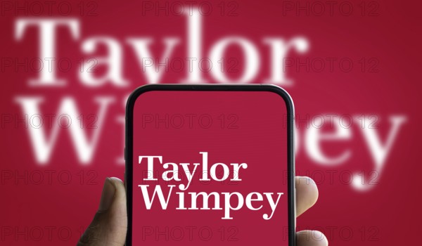 Dhaka, Bangladesh- 5 Dec 2024: Taylor Wimpey logo is displayed on smartphone. Taylor Wimpey plc is one of the largest home construction company.