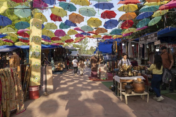 New Delhi, India, April 11, 2023: People at the popular Dilli Haat Food and Craft Bazar, Asia