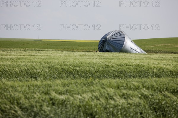 Metal Grain Bin Damaged tornado bent Canada