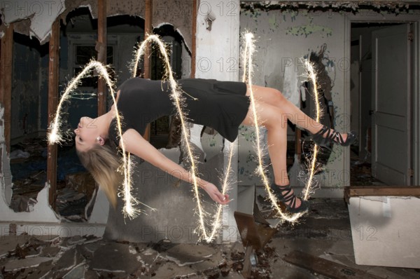 Beautiful young woman floating in the air