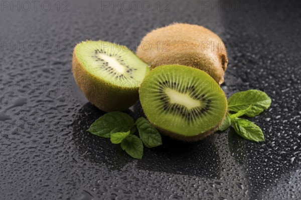 Juicy kiwi fruit and freas mint leaves